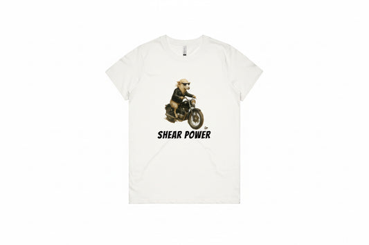 White t-shirt with a graphic of a sheep on a motorcycle and 'Shear Power' text on a white background