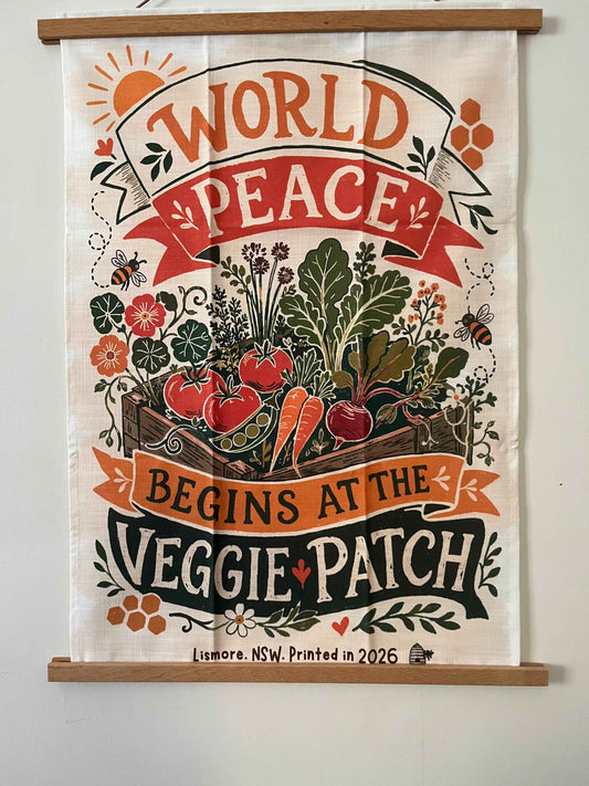 Linen tea towel. World Peace begins at the veggie patch