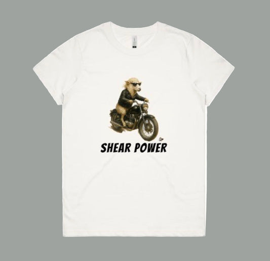 White t-shirt with a graphic of a sheep on a motorcycle and 'Shear Power' text on a white background