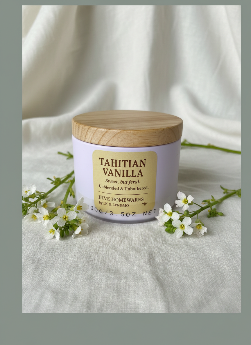 Vanilla candle on a fabric background