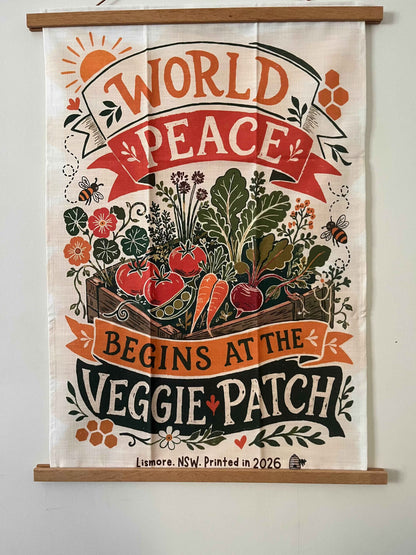Linen tea towel. World Peace begins at the veggie patch