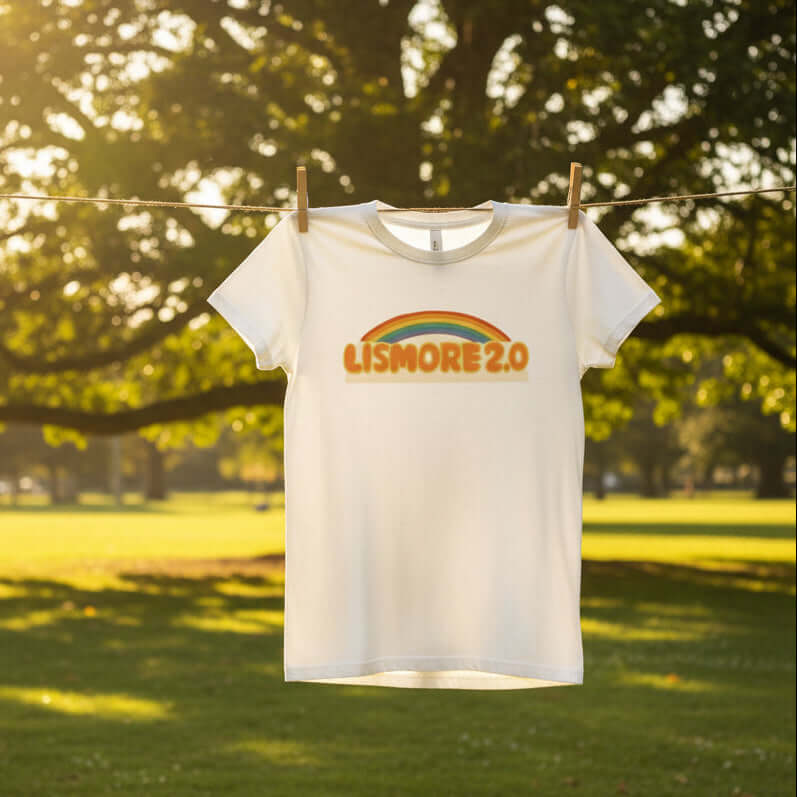 Organic cotton White t-shirt with 'Lismore 2.0' text and rainbow design on a white background
