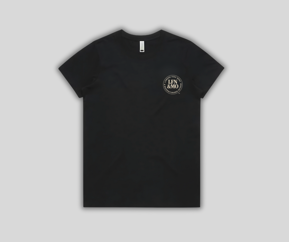 Black t-shirt with a logo on the chest against a light gray background