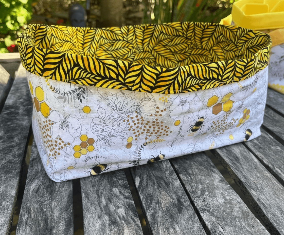 Large Tote Bag Handmade from the Lazy Daisy Collection featuring vibrant yellow and floral patterns.