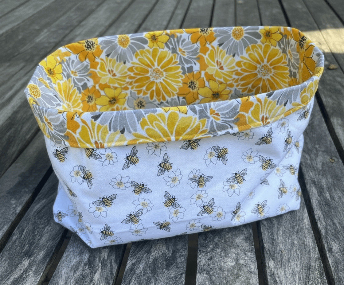 Medium Fabric Tote Bag – Lazy Daisy Collection showcasing a floral and bee design in vibrant colors.