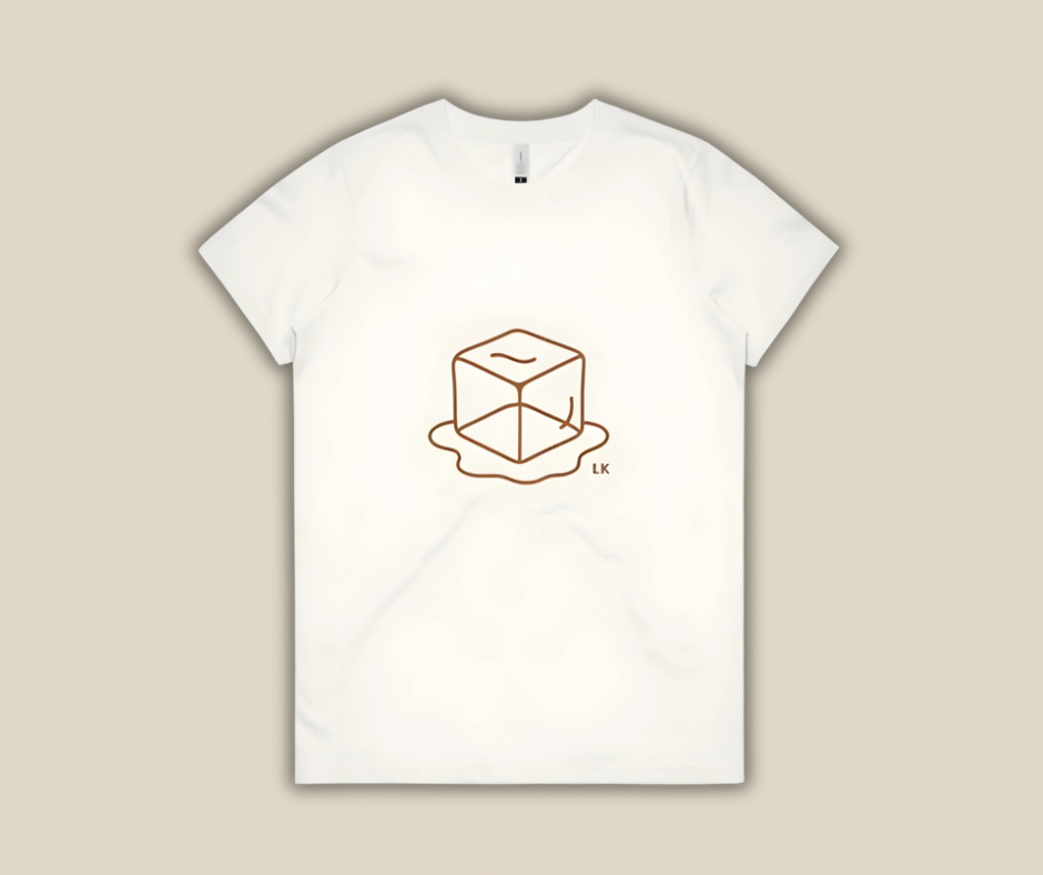 White t-shirt with a geometric design on a beige background