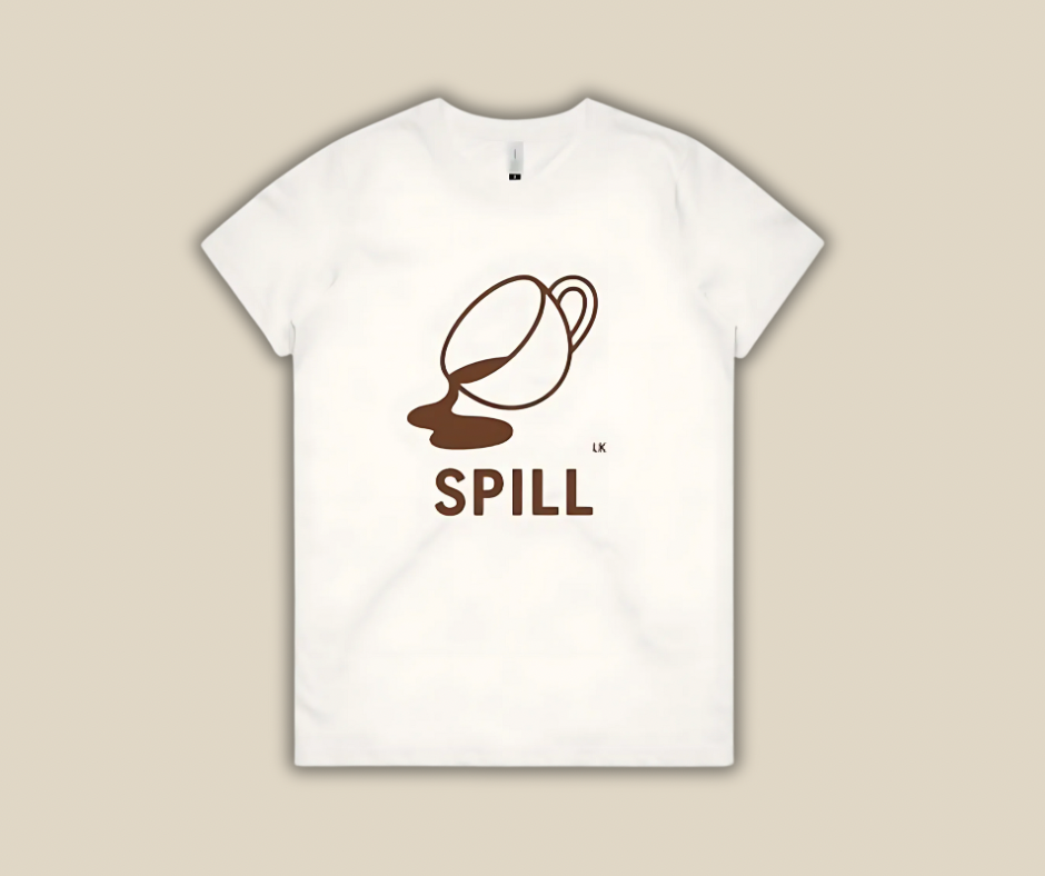 White t-shirt with a brown coffee cup graphic and 'SPILL' text on a beige background