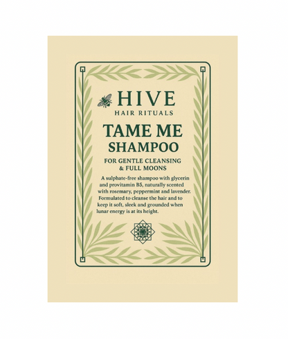 Hive Tame Me Shampoo packaging on a beige background
