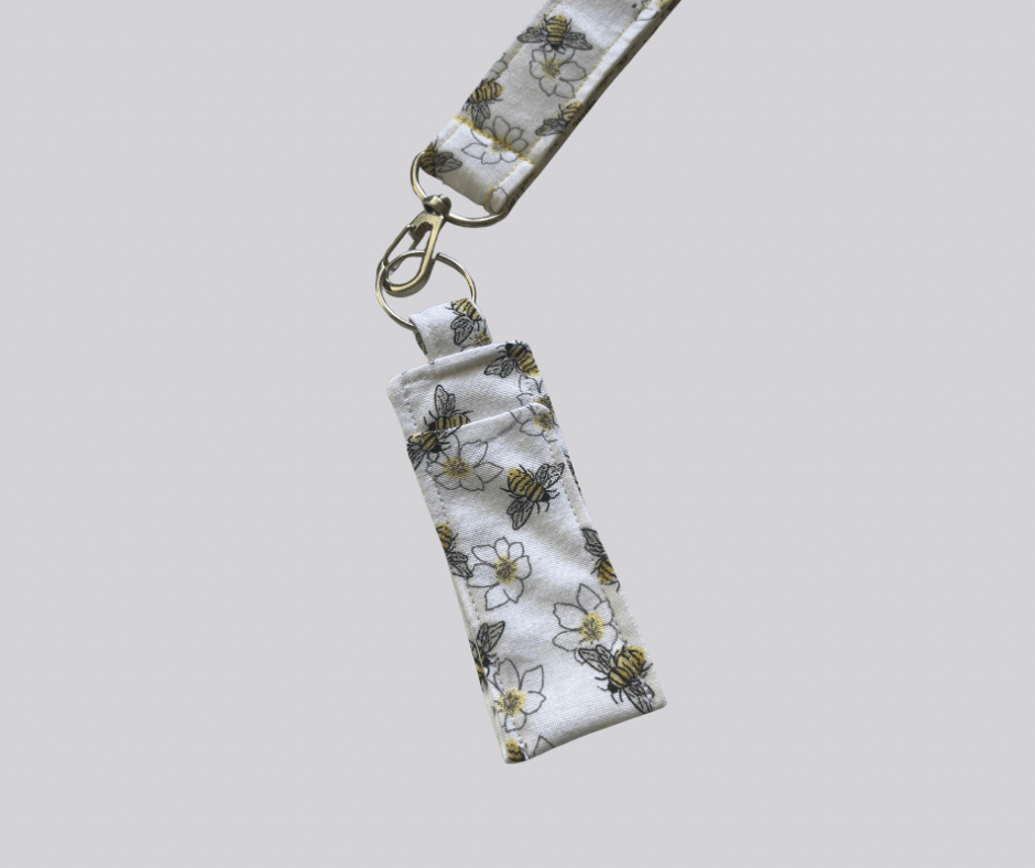 Floral patterned keychain on a light gray background