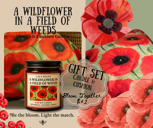 Candle and cushion set with red poppy design and 'Lacy Keane' branding.